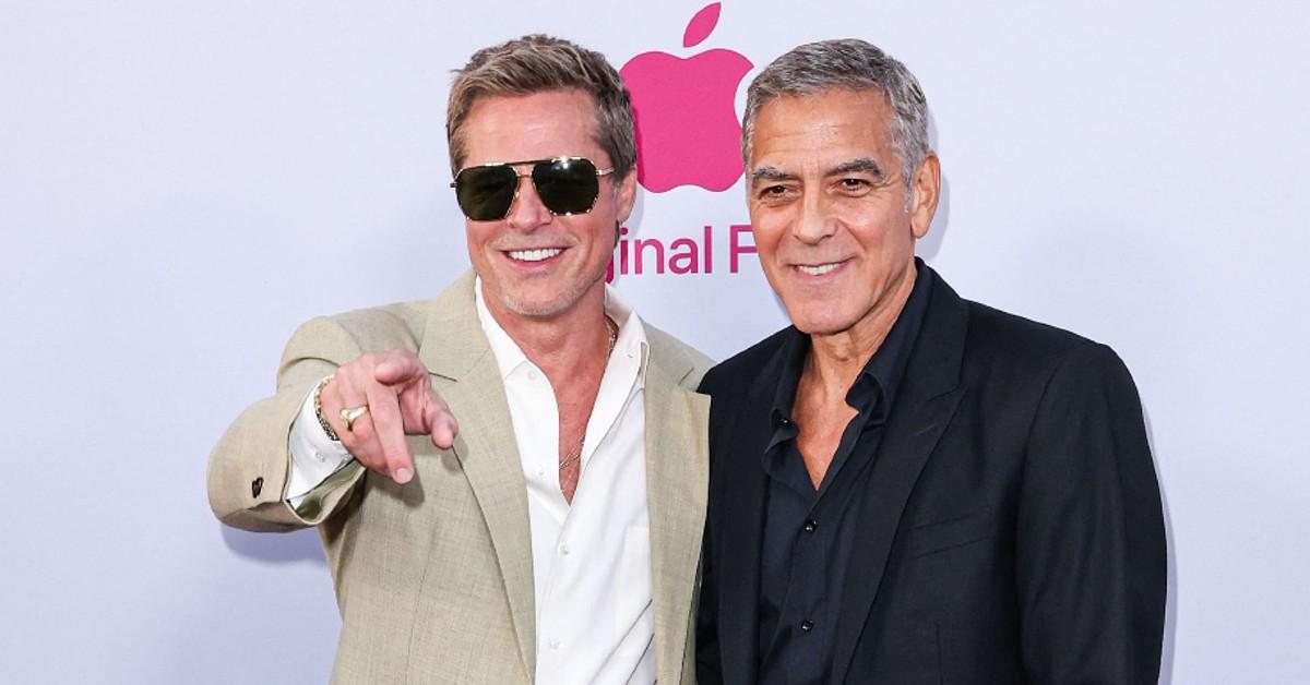 Photo of Brad Pitt and George Clooney at the 'Wolfs' premiere.