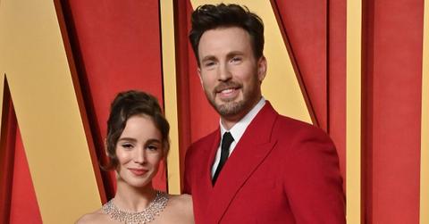 Photo of Alba Baptista and Chris Evans