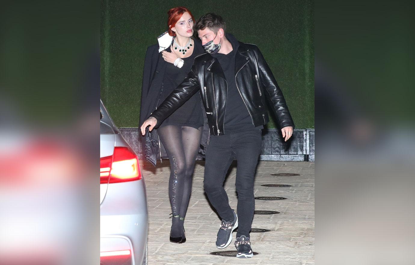 bella thorne and fiance benjamin mascolo walk hand in hand nobu malibu