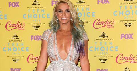 Britney Spears poses in the press room at the Teen Choice Awards 2015