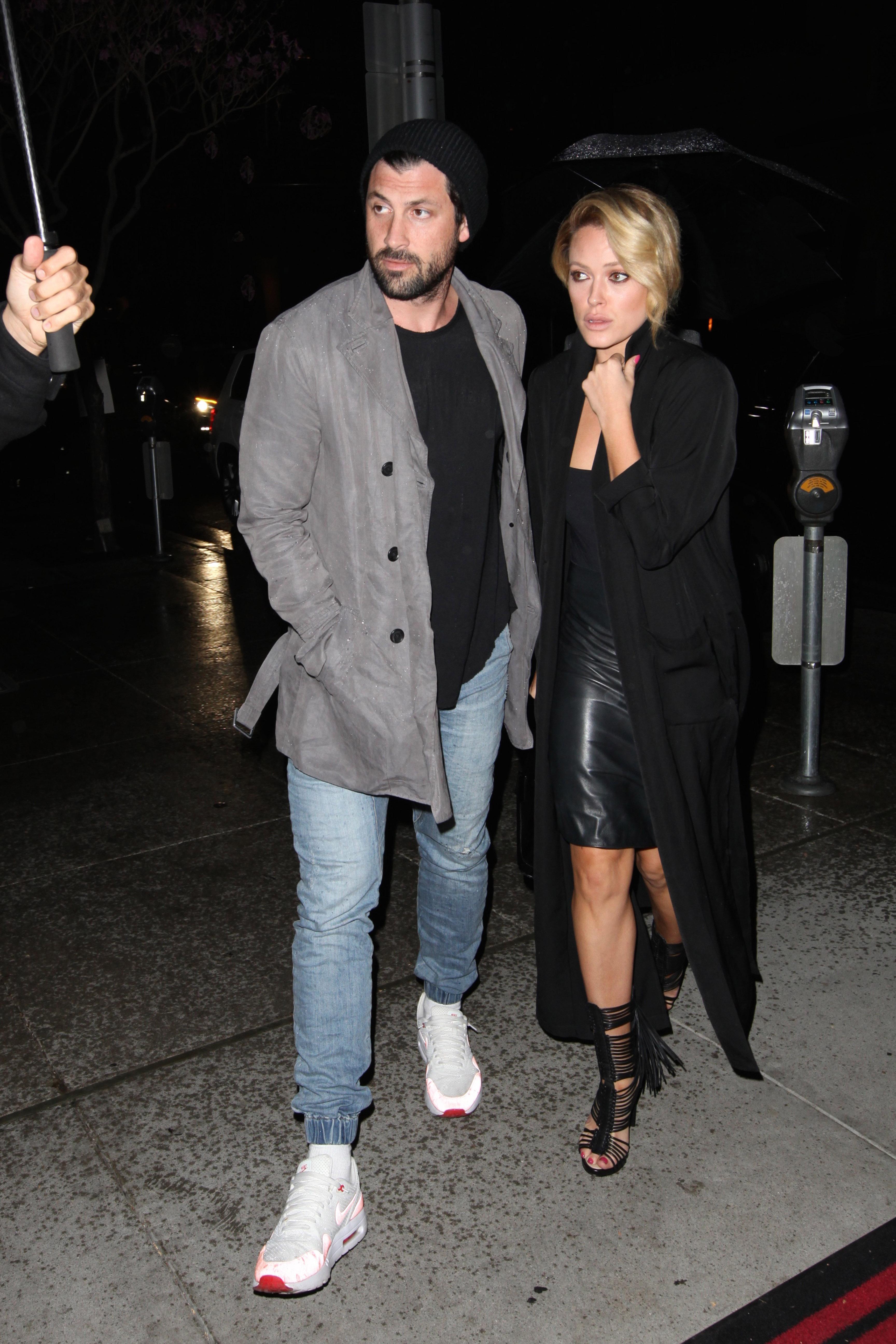 *EXCLUSIVE* Maksim Chmerkovskiy and Peta Murgatroyd brave the rain at Mastro’s