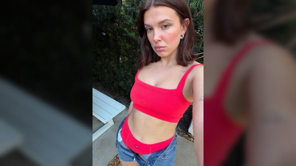 Photo of Millie Bobby Brown paired the coordinating set with low rise denim shorts.  