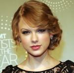 2010__12__Taylor_Swift_Dec281 150×148.jpg