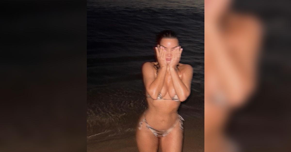 kim kardashian flaunts fit figure zebra print bikini beach photoshoot