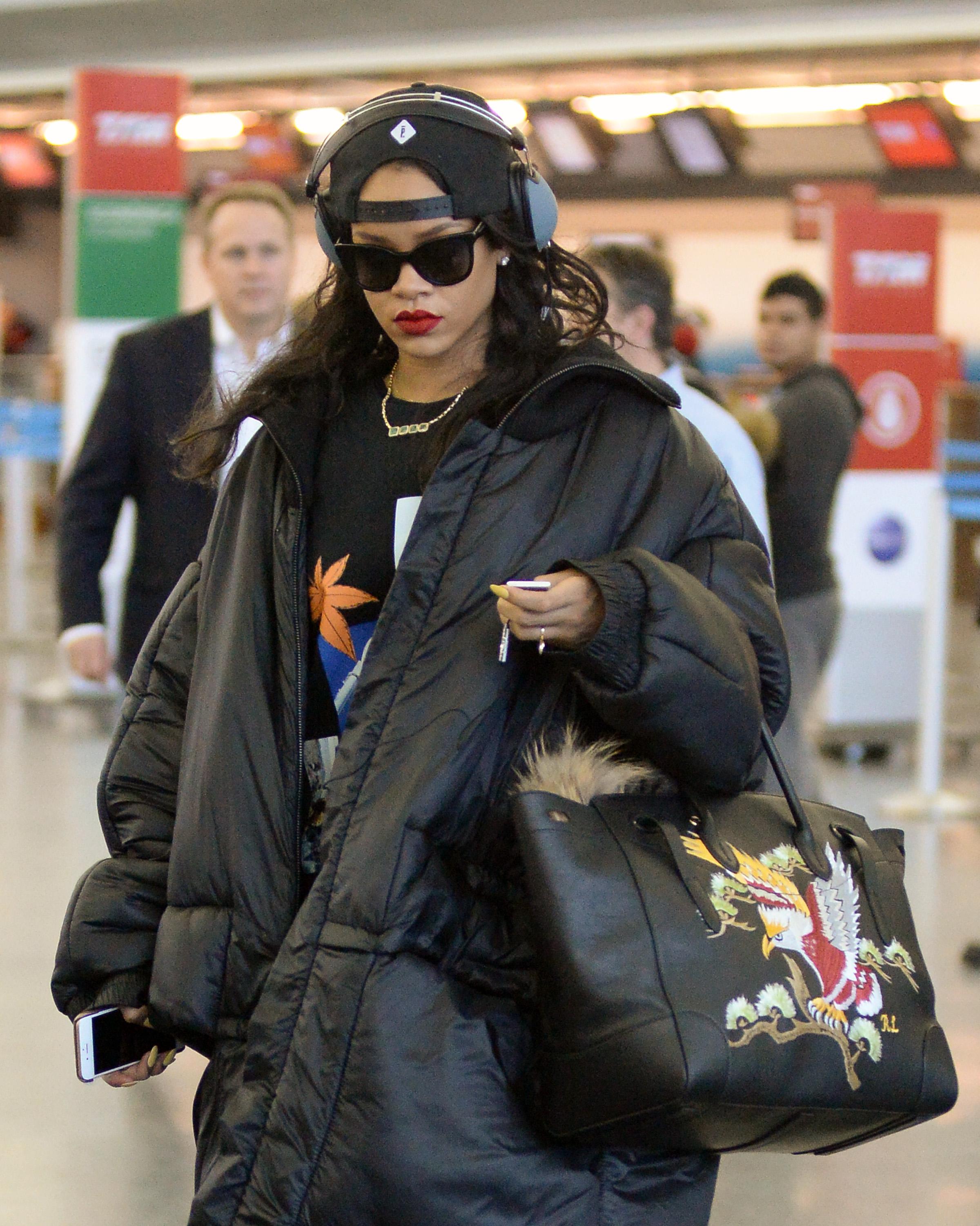 Rihanna Looks Sad After Reports Emerge That Chris Brown Is A Father!