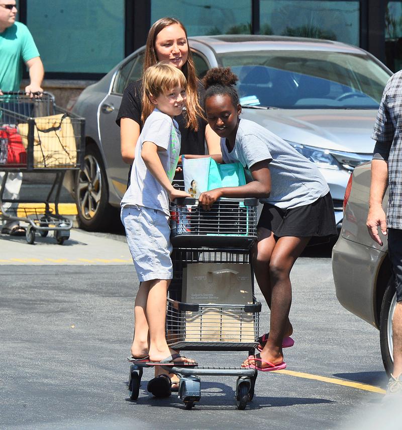 EXCLUSIVE: *PREMIUM RATES APPLY, MUST AGREE FEES* Zaraha Jolie Pitt and brother Knox Jolie Pitt spotted out with nanny and bodyguard during a grocery shopping run on September 16