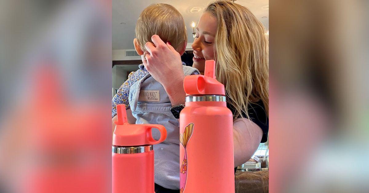 amber heard welcomes twins fertility struggles