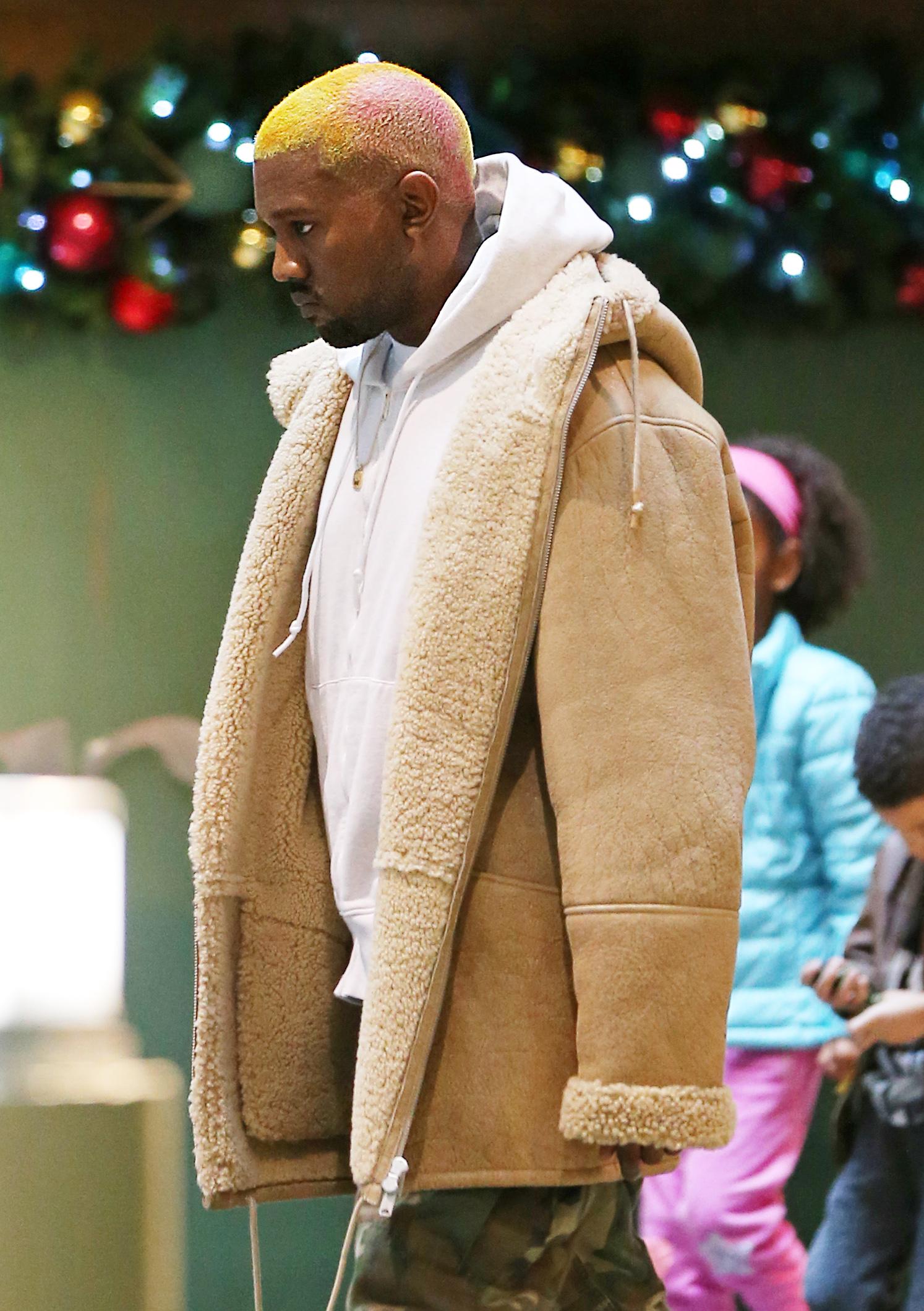 **EXLCUSIVE PREMIUM RATES APPLY** Kanye West going to the movies on his own the day after christmas