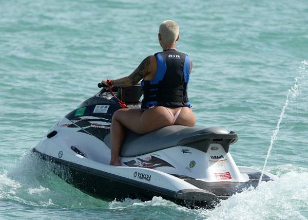 Amber Rose Bares Booty In Thong Bikini, Fuels Butt Implant Rumors