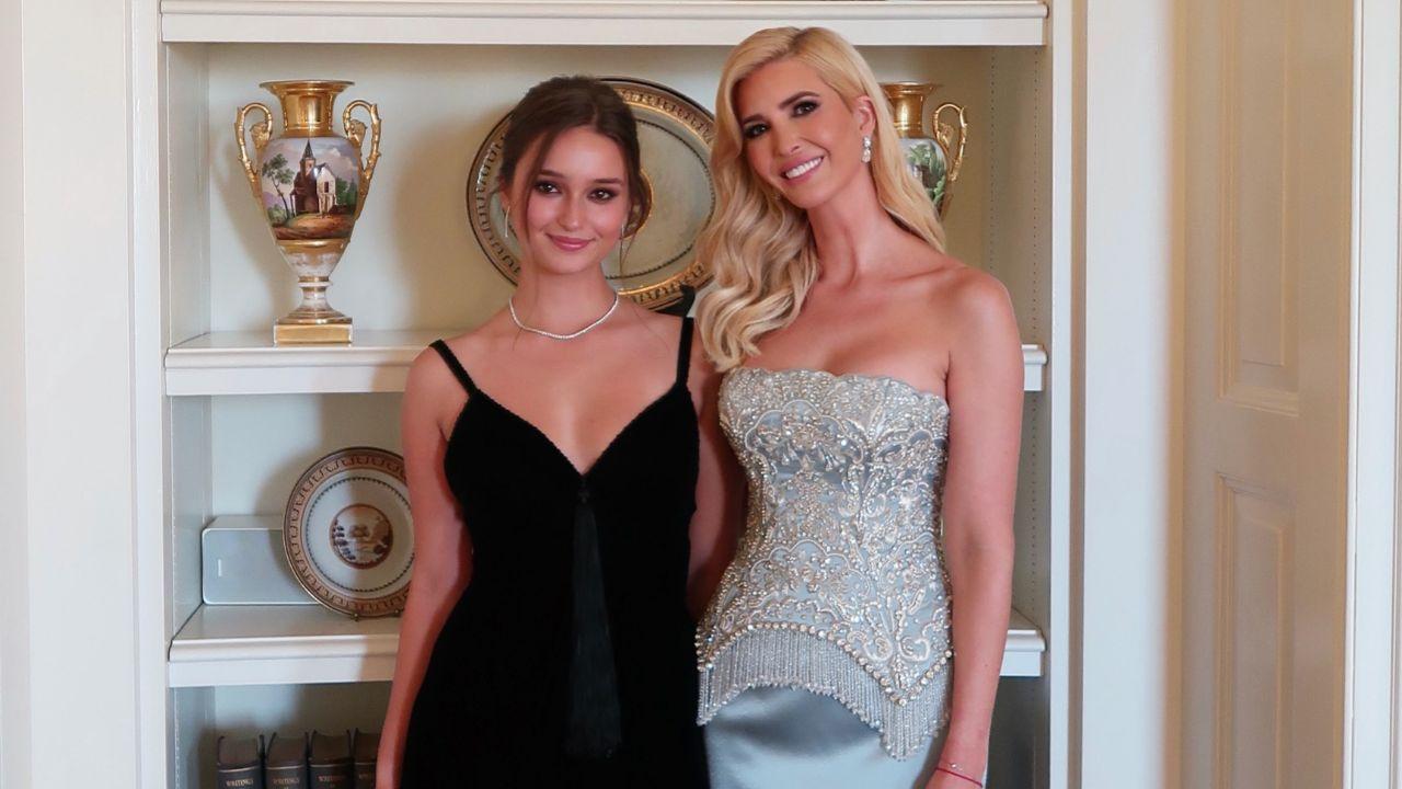 Image of Arabella looks all grown up in a floor-length black gown as she posed alongside her mom.