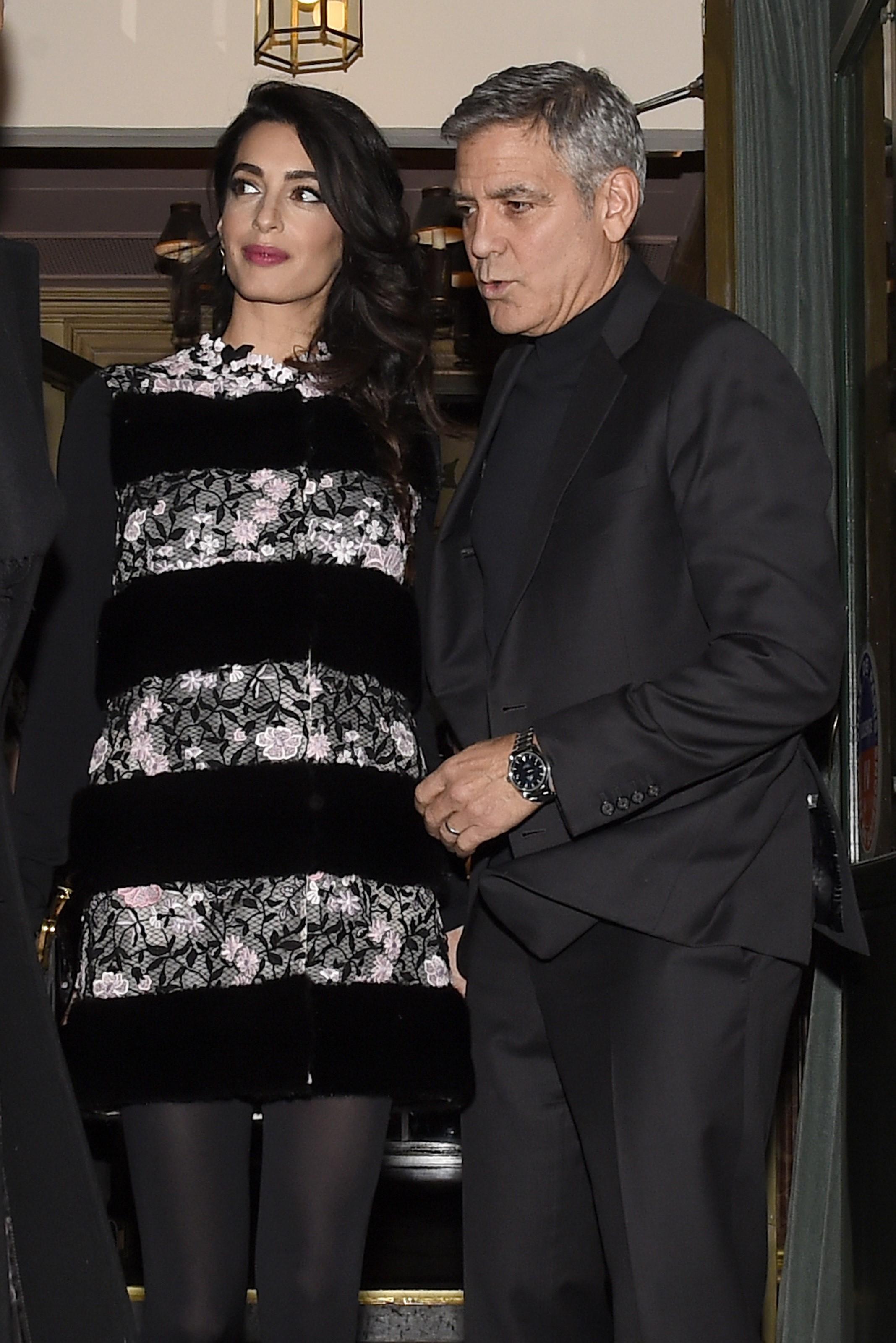 George Clooney dotes on pregnant Amal Clooney in Paris