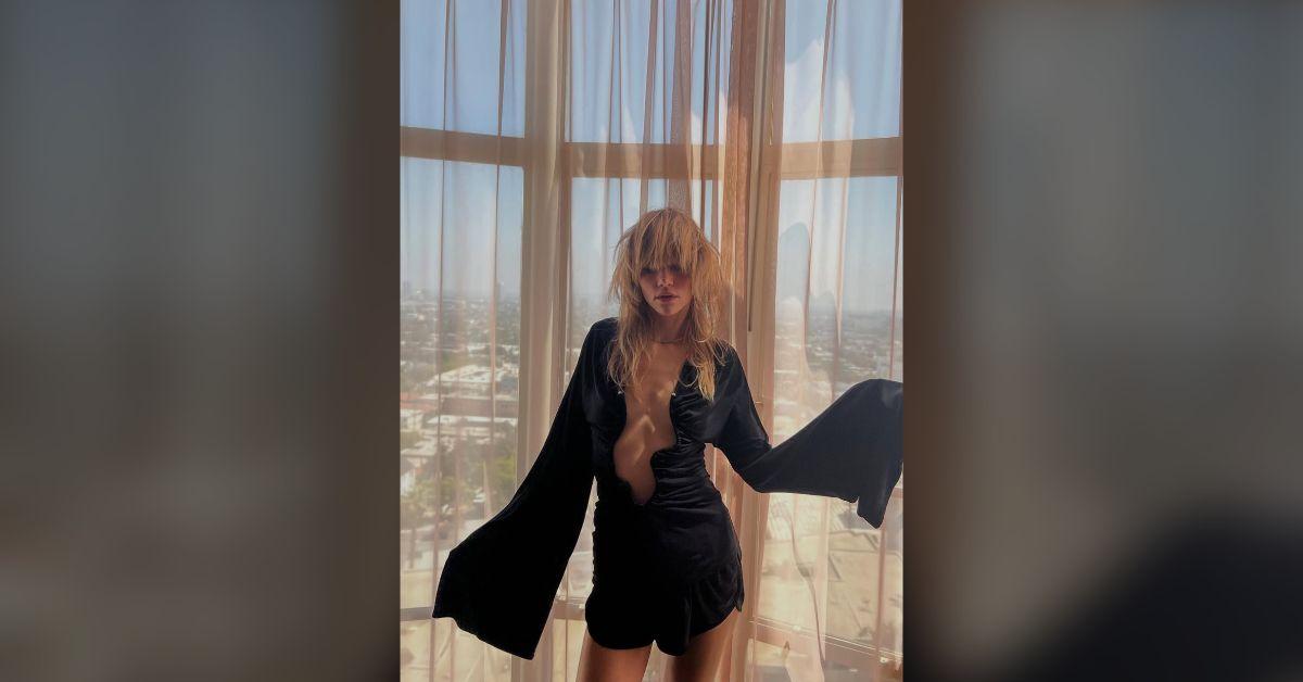 suki waterhouse flashes abs nearly see through sparkly top photos
