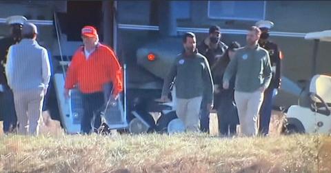 Donald Trump Jr exits Marine One with no mask