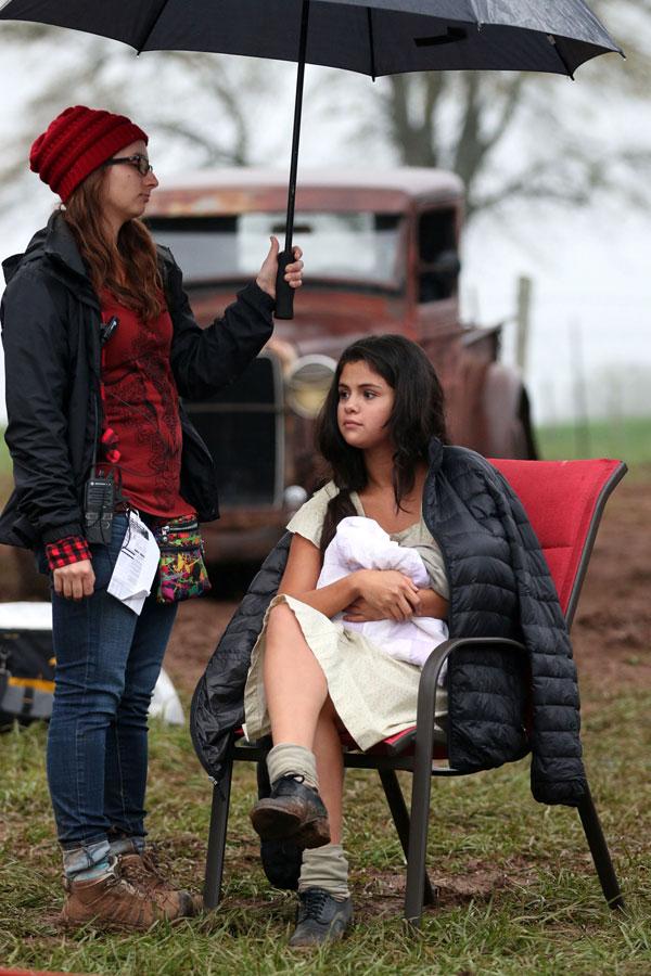 Selena gomez holds baby dubious battle set 01