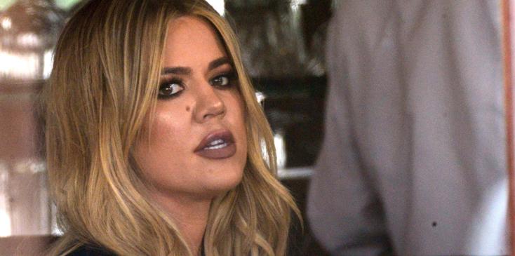 Khloe Kardashian does not look to be having that great a time as she has lunch and films at the trendy Il Pistaio Restaurant in Beverly Hills, Ca