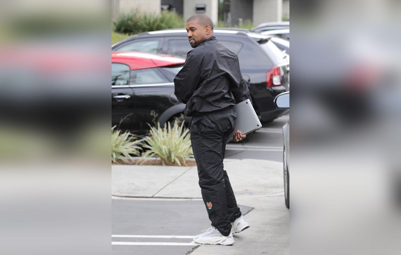 Kanye West heads to work after the arrival of baby #3