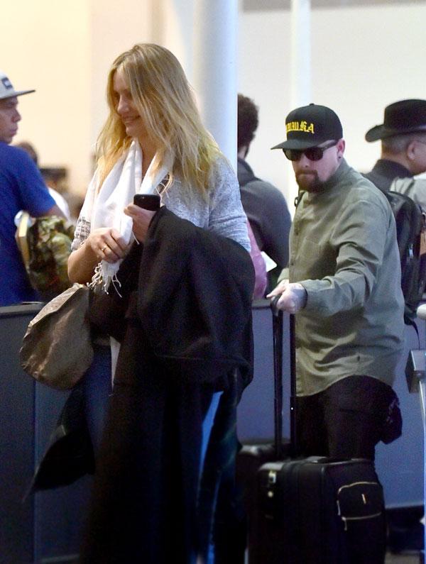 Cameron diaz benji madden joel nicole richie airport vacation couples expecting 06