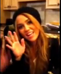 2010__12__Miley_Cyrus_Dec27news 206×300.png