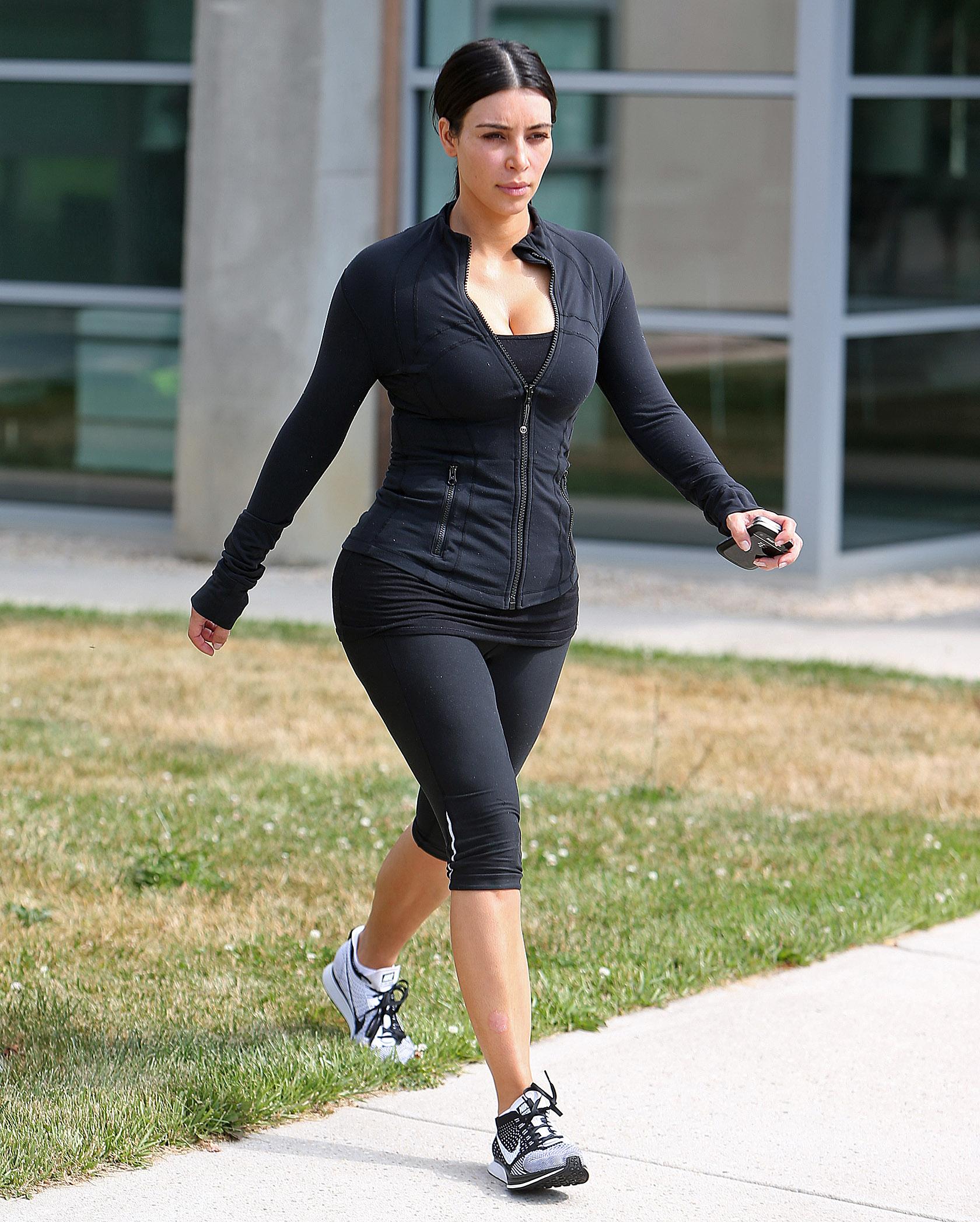 Kim Kardashian with Kourtney Kardashian, Khloe Kardashian and mother Kris Jenner leave the gym in South Hampton in New York.