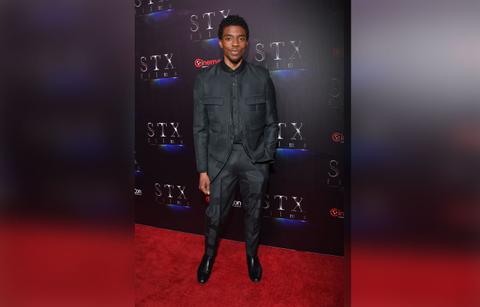 A Look Back At Chadwick Boseman's Best Red Carpet Looks