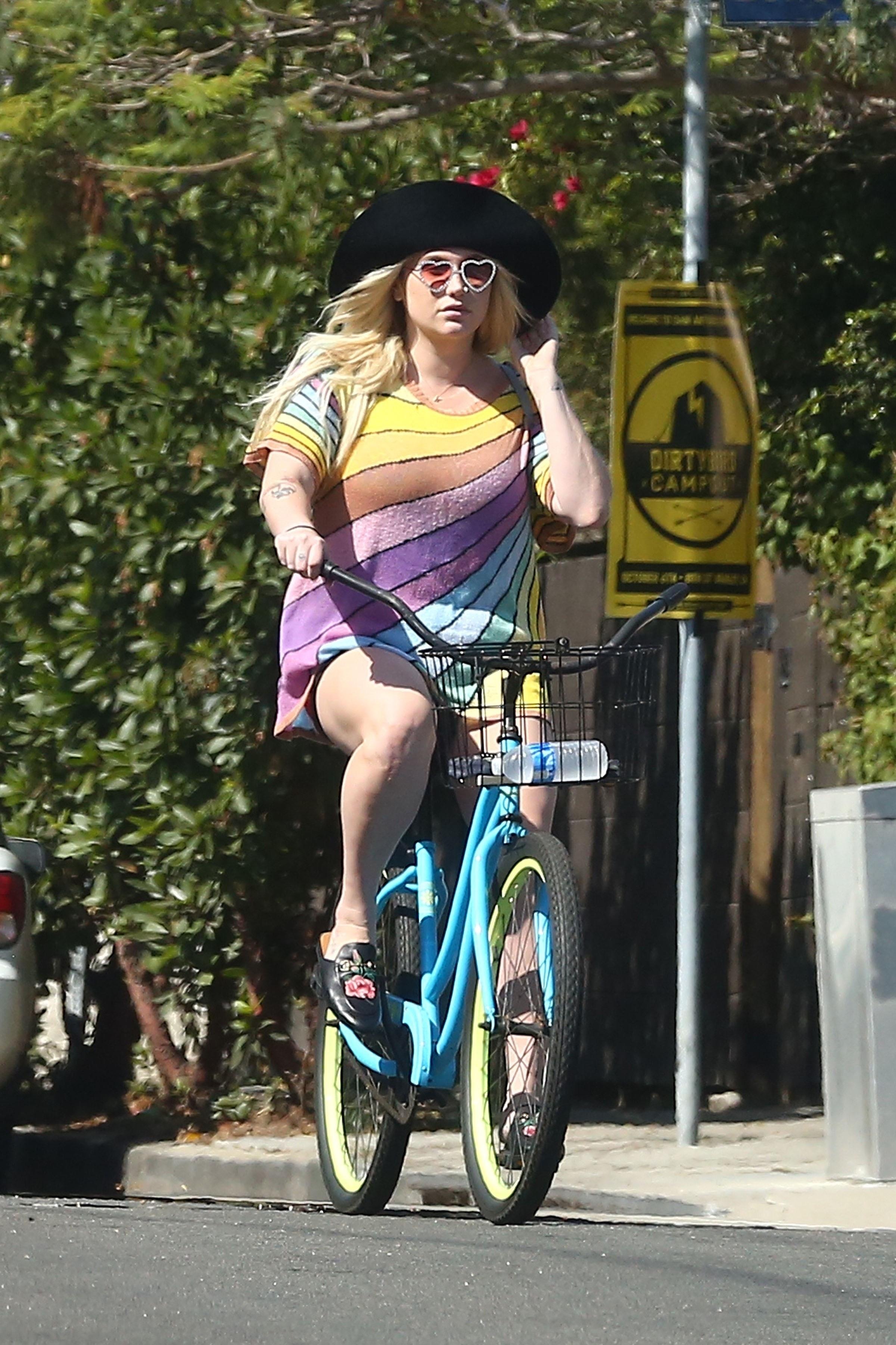 *EXCLUSIVE* Kesha enjoys a bike ride with her boyfriend after releasing her new single &#8220;Praying&#8221;