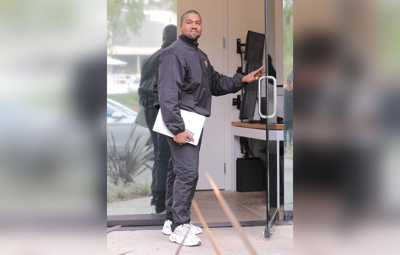 Kanye West heads to work after the arrival of baby #3