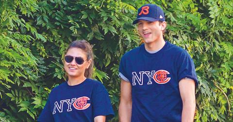 Mila Kunis and Ashton Kutcher wear matching Chicago Bears shirts