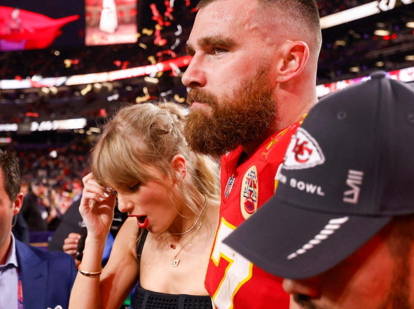 taylor swift travis kelce vacation tropical locale hiatus touring