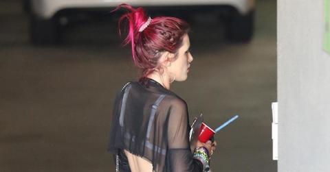 *EXCLUSIVE* Bella Thorne shows off her toned tummy while arriving to a friends house