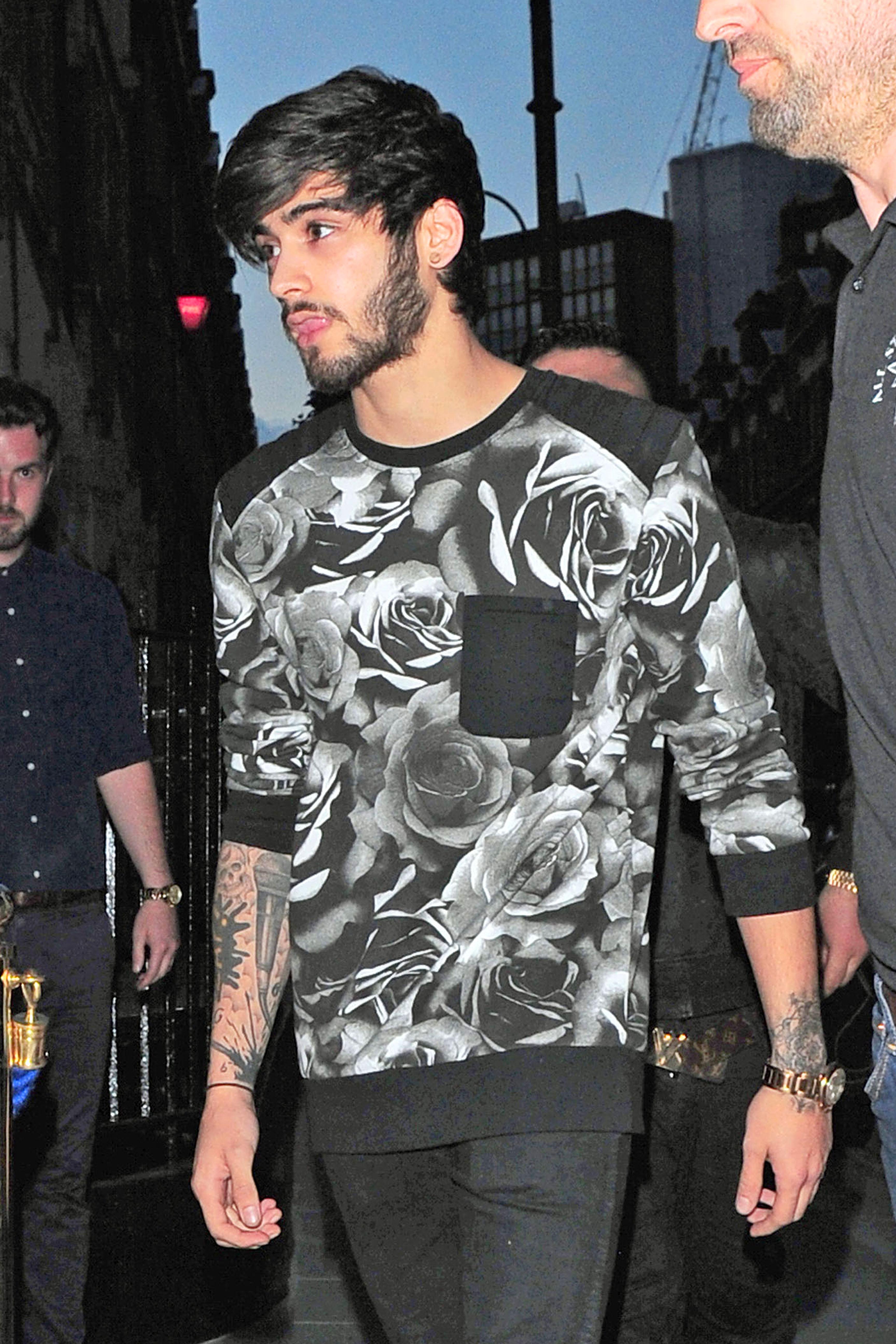 Zayn Malik arrives at the Chiltern Firehouse with a bodyguard **USA ONLY**