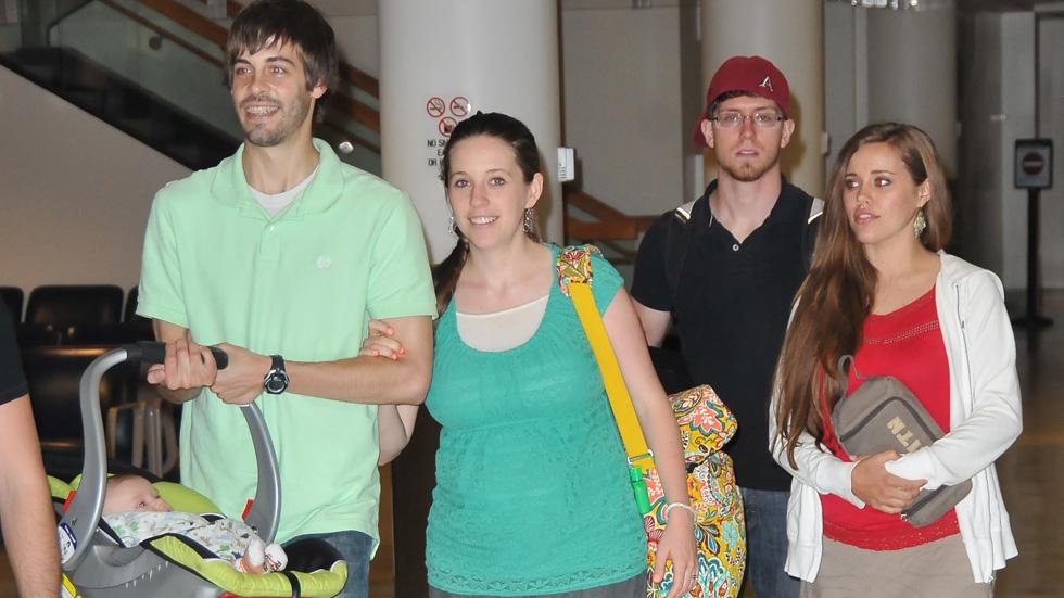 EXCLUSIVE: Jill and Jessa Duggar spotted Akron Airport with their husbands