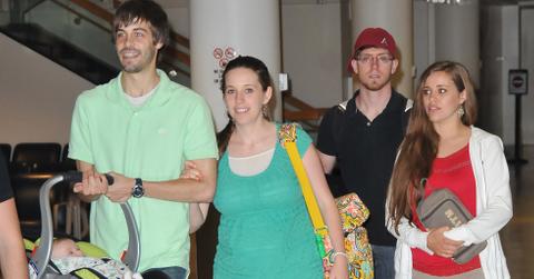 EXCLUSIVE: Jill and Jessa Duggar spotted Akron Airport with their husbands