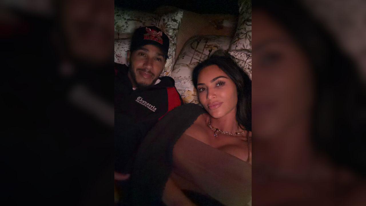 image of The pair cuddled up in bed together.