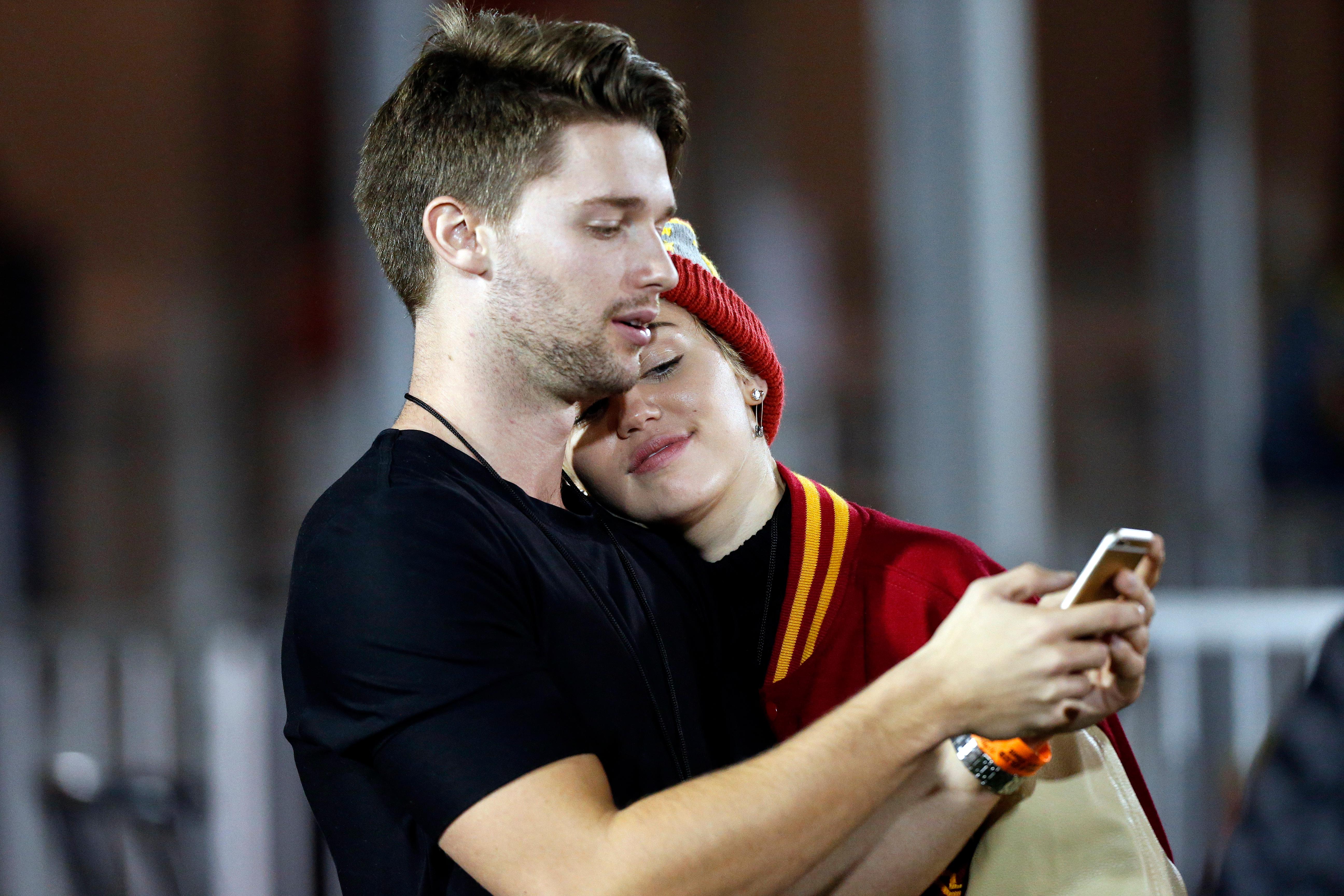 Patrick Schwarzenegger and Miley Cyrus sighting at USC football game