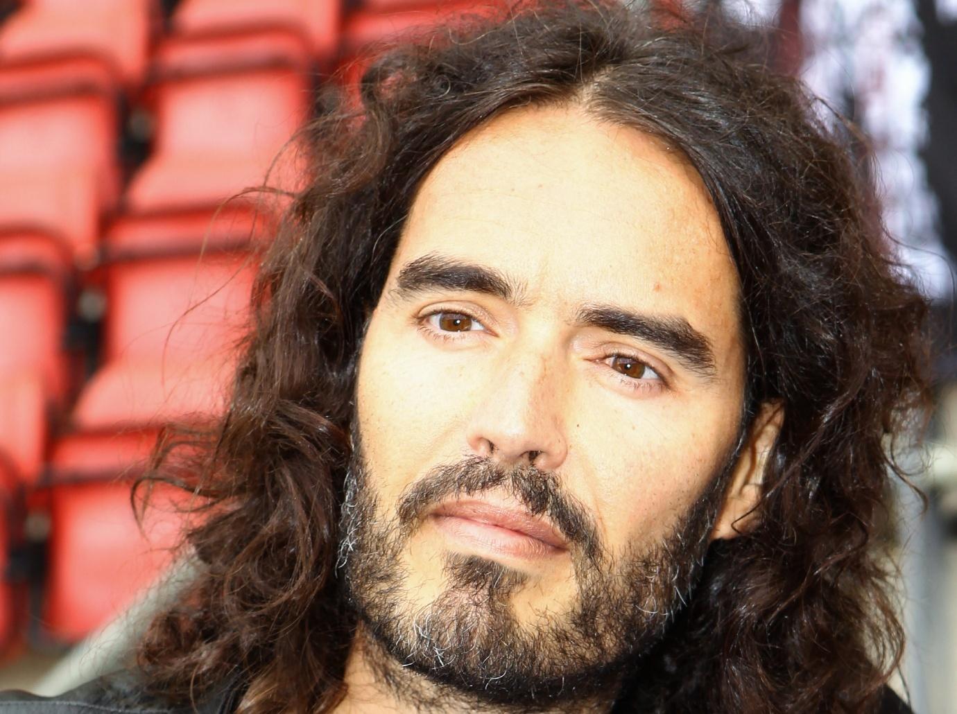 russell brand exposed himself woman workplace joked radio show