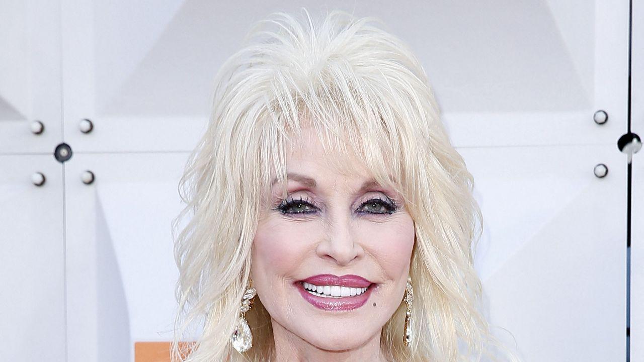 Image of Dolly Parton reflected on Whitney Houston's funeral and the emotional moment 'I Will Always Love You' played.