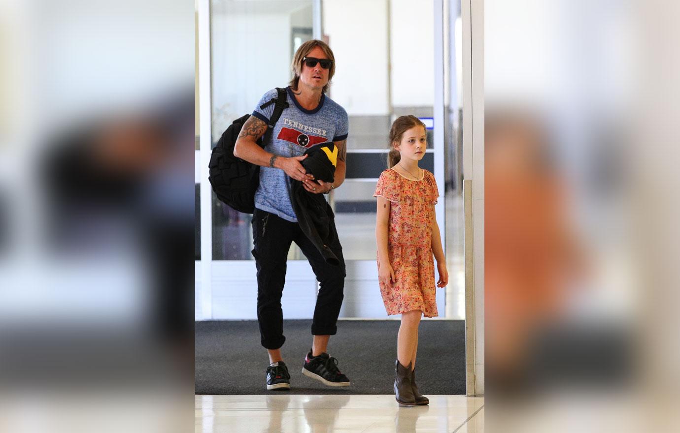 EXCLUSIVE: Keith Urban, Faith Margaret Kidman and Sunday Rose pictured leaving Sydney.