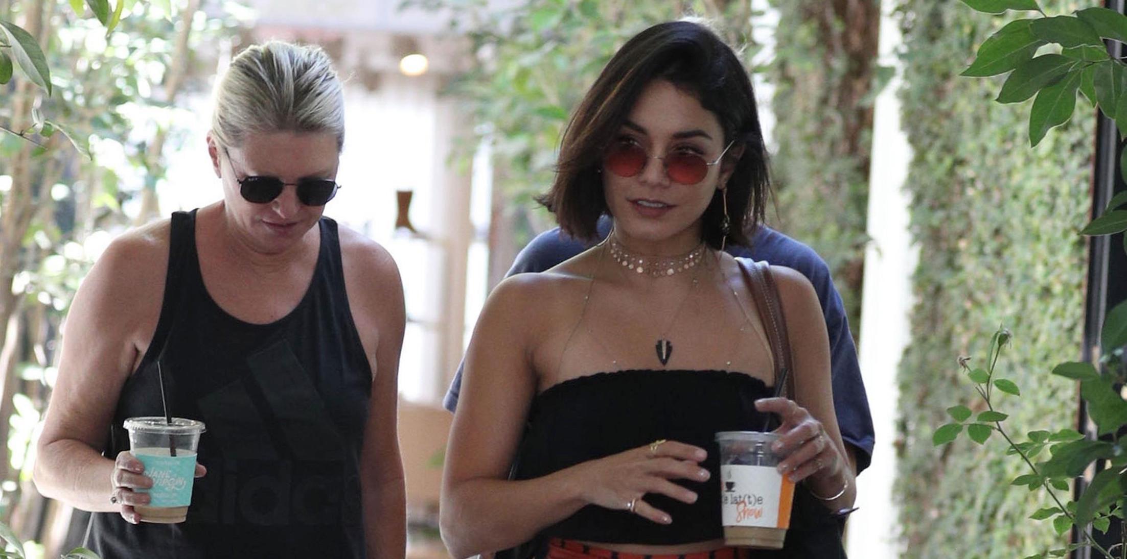 Vanessa Hudgens laughs it up with friends while shopping