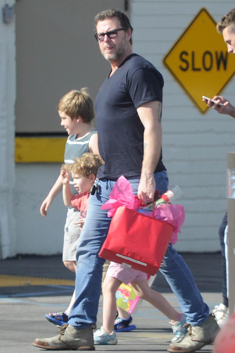 **PREMIUM RATES APPLY** Tori Spelling&#8217;s husband Dean McDermott carries a bag of romantic gifts as he visits a Los Angeles hospital on Valentine&#8217;s Day