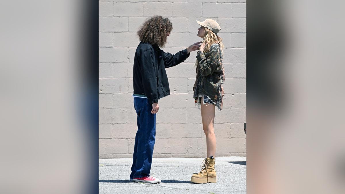 image of A friend was seen examining Paris Jackson’s neck after fans recently pointed out its 'weird' appearance.