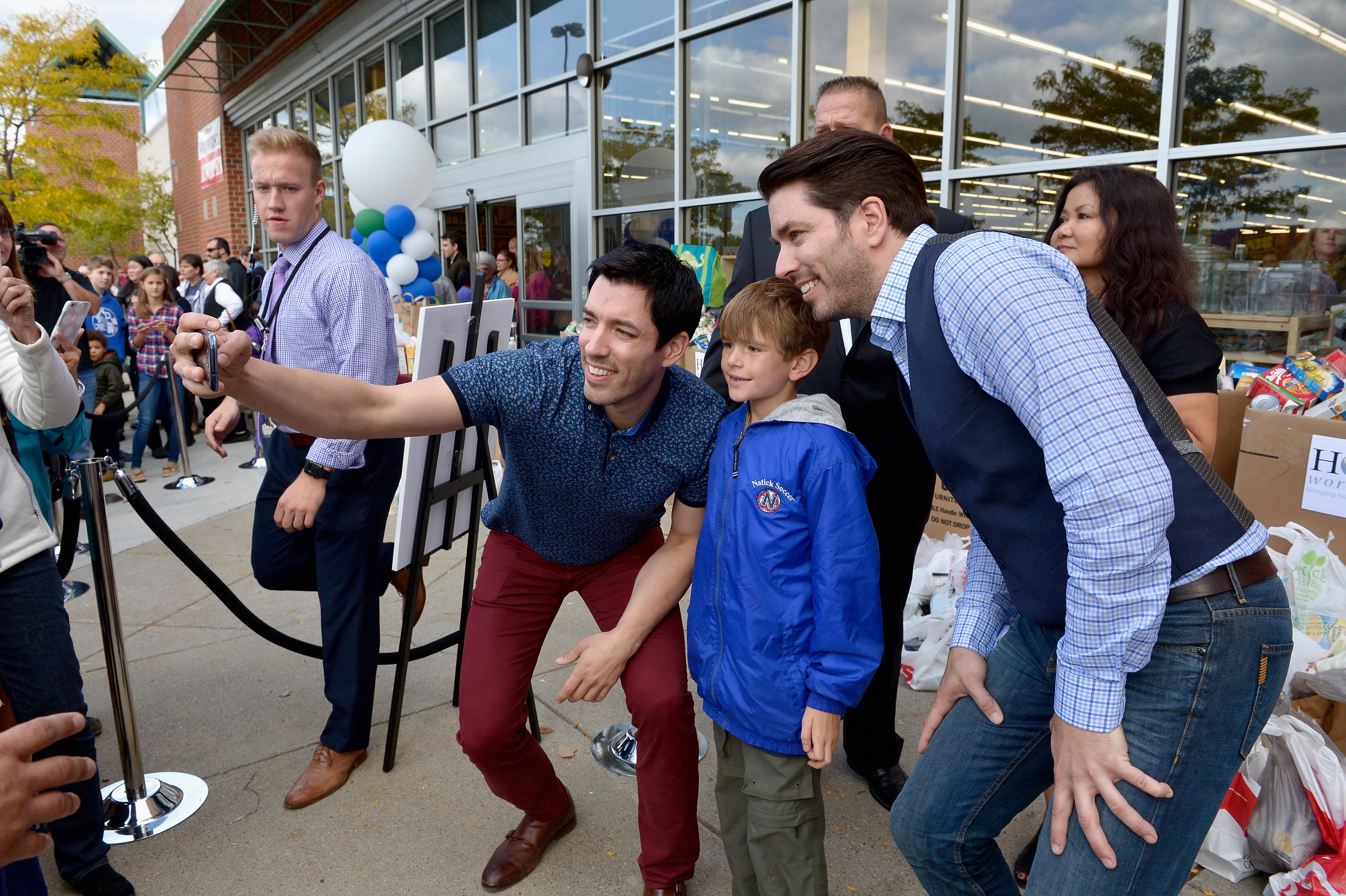 The Property Brothers Celebrate The Opening Of The New Cost Plus World Market In Framingham, MA