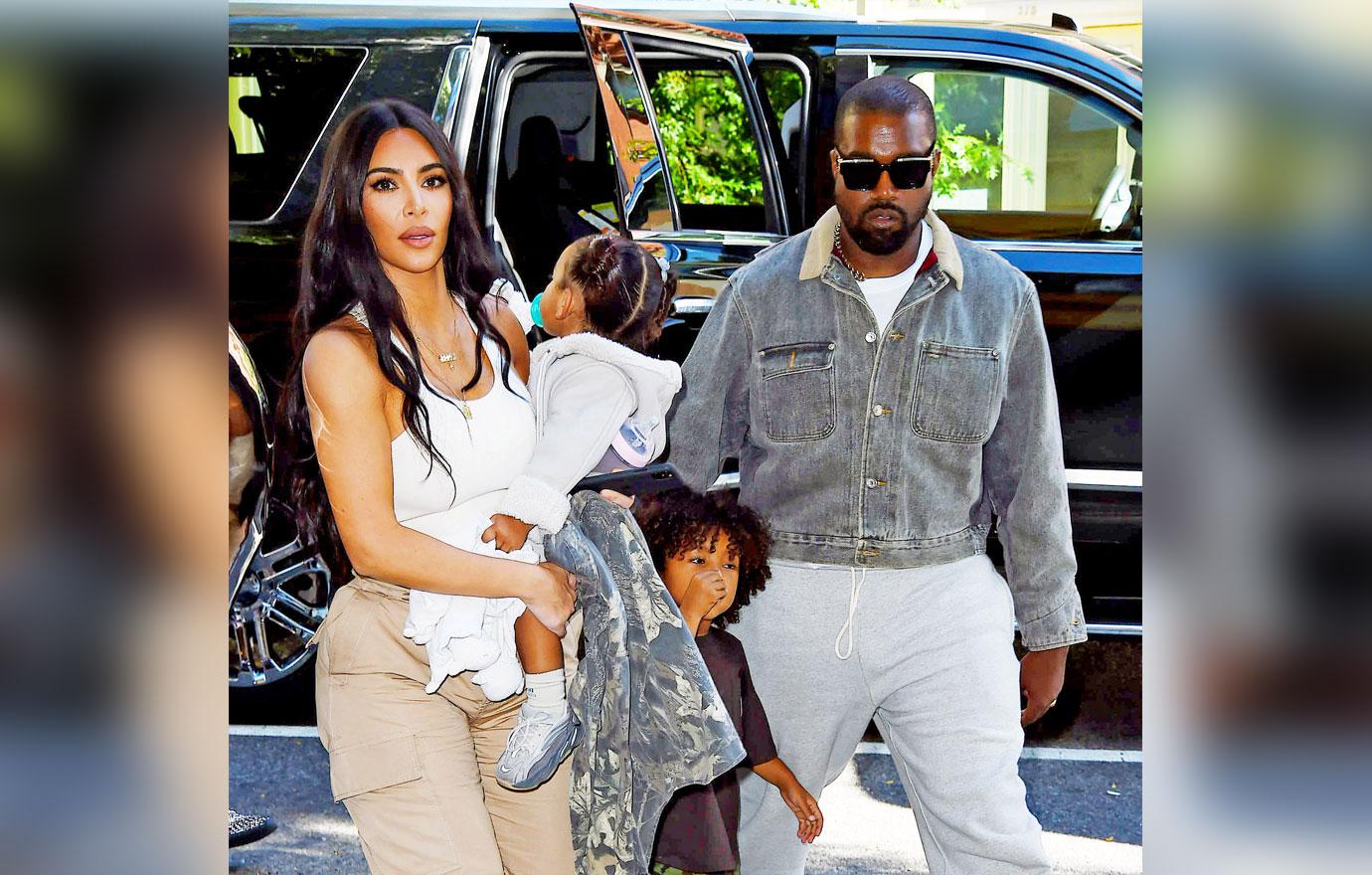 Kim and Kanye Walking With Their Kids