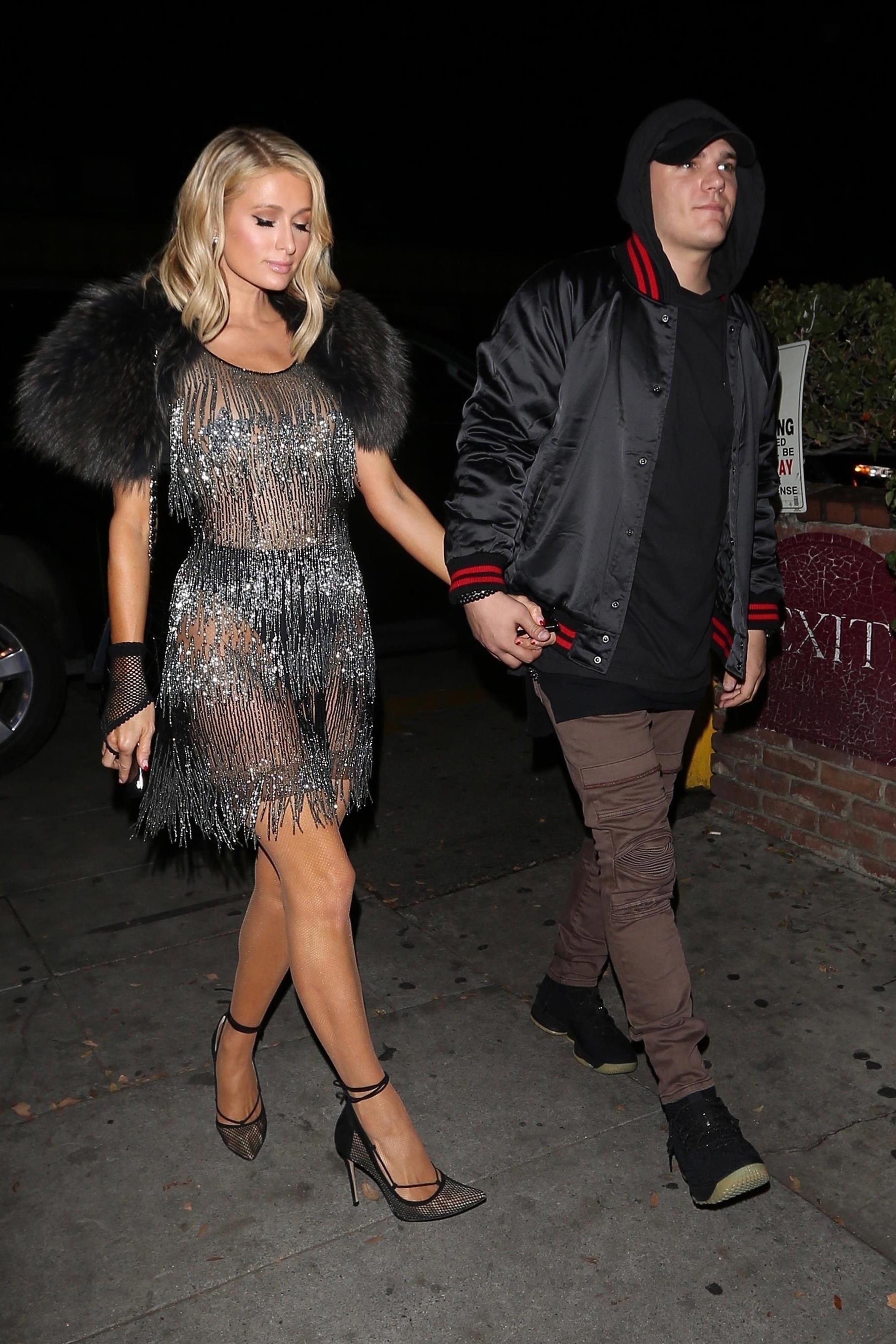 Paris Hilton and Chris Zylka arrive at Delilah for date night