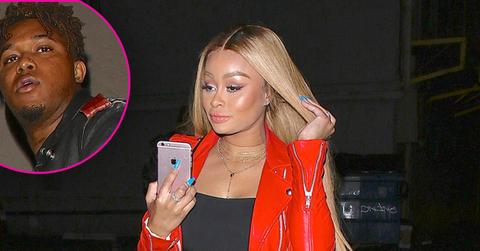 *EXCLUSIVE* Blac Chyna uses her phone to block her face after stepping out with a Mystery Male