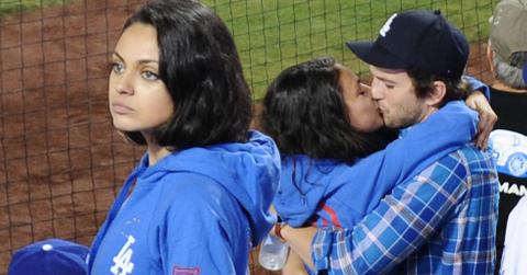 Ashton kutcher mila kunis pda kissing baby