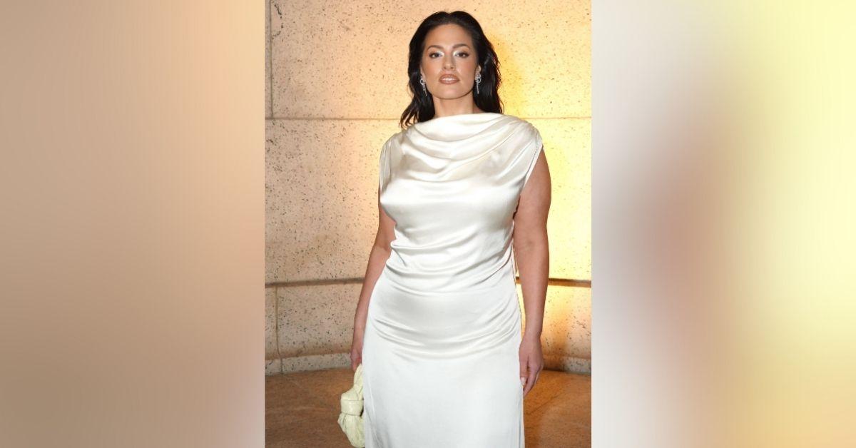 image of The model's ivory silk gown fit perfectly and highlighted her curves.