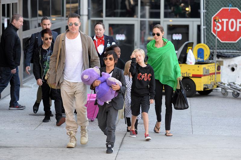 Brad Pitt and Angelina Jolie return to Los Angeles with their family