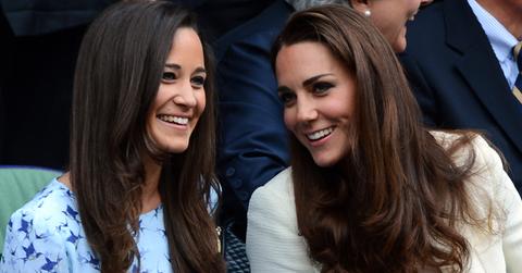 Catherine, Duchess of Cambridge (R) and