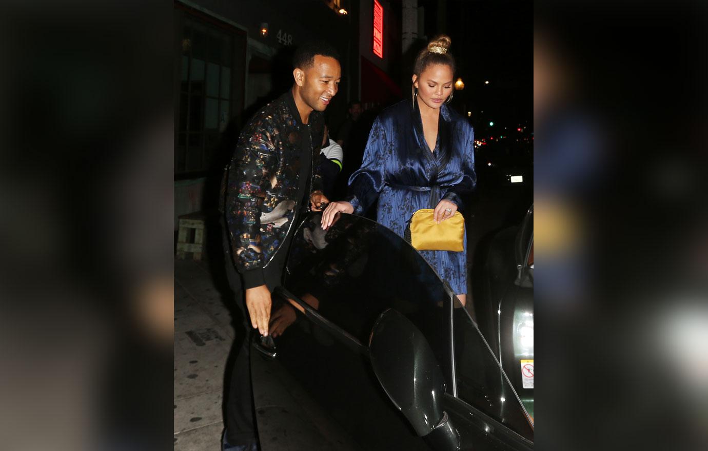 Chrissy Teigen and John Legend walk hand in hand as they exit Jon &amp; Vinny&#8217;s restaurant after dining with friends