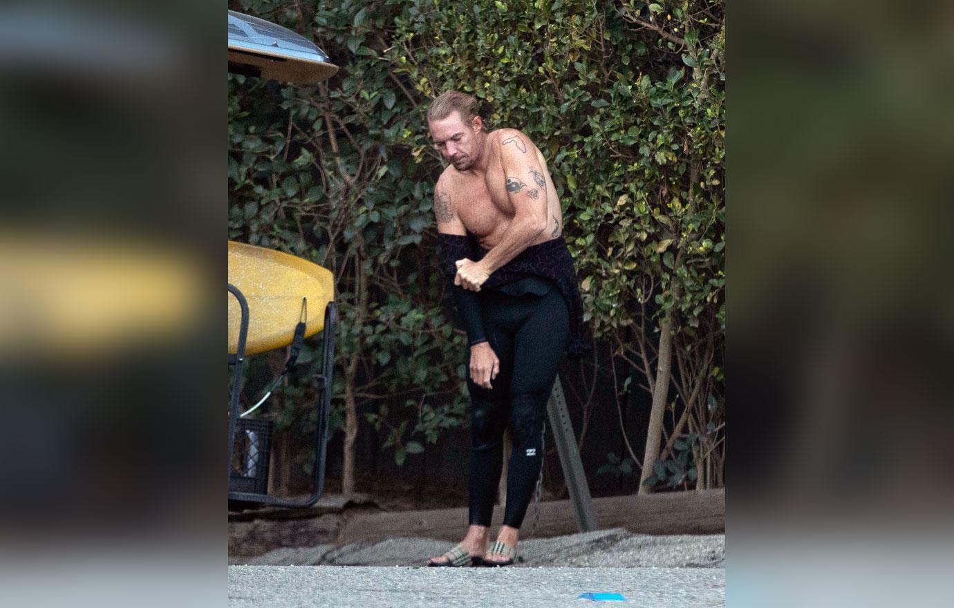 diplo shows amazing body tattoos surfing malibu